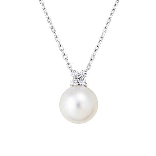 Elegant freshwater pearl pendant necklace with a sterling silver chain and a cubic zirconia accent.